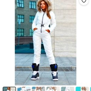 Women's stylish fitted belted, ski jumpsuit with fur fox hood, zip pockets